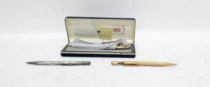 Silver propelling pencil, two cross mechanical pencil and ballpoint pen and a gold-coloured metal