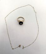 Gold-coloured ring set with oval gold stone paste, unmarked and a fine gold box-link chain marked