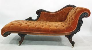 Early Victorian mahogany chaise longue with foliate carved exposed frame, raised upon white china