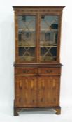 Two 20th century yew bookcase cabinets with astrag