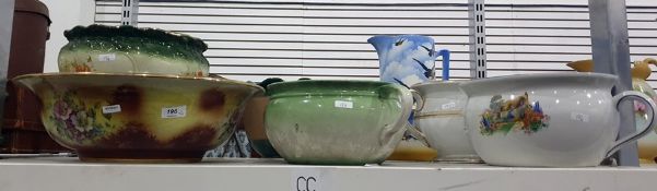 Four early 20th century chamber pots, a large basin and pot