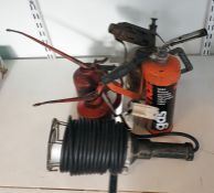 Vintage brass blow torch, two oil pumps, an inspection lamp and another blow lamp
