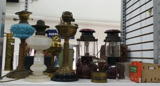 Victorian brass and blue opaque glass oil lamp, th