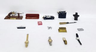 Bottle of Avon 'Black Suede' aftershave in eagle bottle, quantity of watches, lighters and other