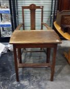 Early 20th century oak carver chair with roundel motif to the top rail, with upholstered seat and