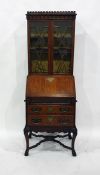 Early 20th century oak bureau/bookcase with applie