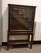 Single glazed door cupboard enclosing shelf, with open recess under, 65cm x 110cm