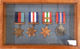 WWII group of four in mahogany case,WWI war medal and Victory medal named to 