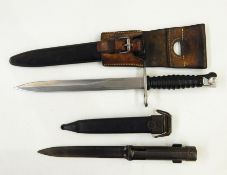 Swiss 1957 pattern bayonet with scabbard and frog, and a socket bayonet and scabbard (2)