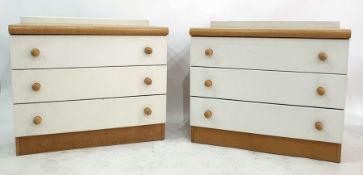 Pair of oak topped three-drawer chests to plinth b