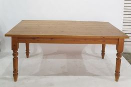 20th century pine rectangular dining table on four turned supports and a set of six pine-framed