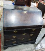 Oak bureau, the fall above two short over two long drawers, to bracket feet