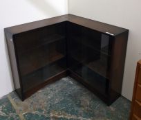 Corner bookshelf unit with sliding glass doors enc