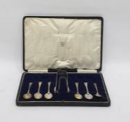 Six various silver teaspoons and a pair matching spoon-end sugar nips plus another sugar nips (8)