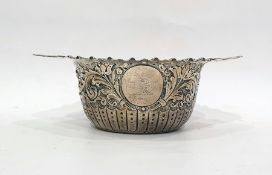 Victorian silver sugar bowl, semi-gadrooned and rococo repousse with engraved tab handles, 18cm
