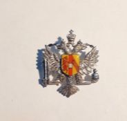 9ct white gold and enamel armorial brooch with enamelled shield, on twin-headed eagle white metal