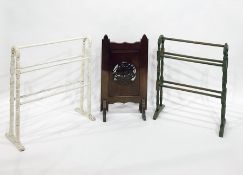 Two painted towel rails, a child's crib, a table-top drawer unit with porcelain drawers and a fire