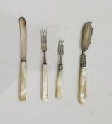 Victorian silver and mother-of-pearl handled butter knife, Sheffield 1875, scroll engraved, maker