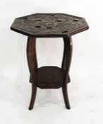Eastern hardwood octagonal centre table with carved dragon motif to top, 60cm x 72cm