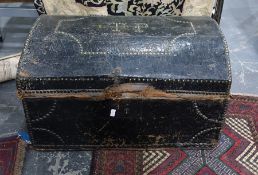 Black leather dome-top brass studded trunk bearing