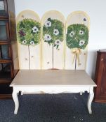 20th century rectangular coffee table with cream painted base and a three-fold arch-top draught