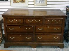 George III style oak and mahogany cross-banded North Country mule chest, the lift top with moulded