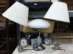 Pair of modern metal table lamps, two other lamps, two Roberts digital radios and two large alarm