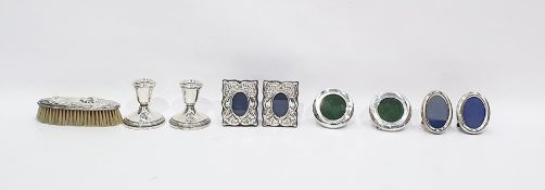 Pair of silver photograph frames of circular form, 7cm diameter, another pair of photograph frames