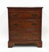 20th century burr oak-effect chest of drawers, the moulded edge above brushing slide, three drawers,