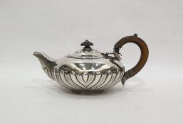 George IV silver teapot by Richard Sibley, London 1825, of squat half-fluted circular form with