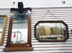20th century oak framed mirror with mask surmount and initialled 'DEB DHH 1932' lower and an
