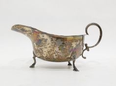 Silver sauce boat by Martin Hall & Co Ltd, Birmingham 1922, with wavy rim and scroll handle, 3oz