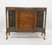 20th century walnut breakfront cabinet with panelled central drawer flanked by astragal-glazed
