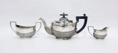 Edwardian silver bachelor's three-piece teaset by Marston & Bayliss, Birmingham 1901, of half-fluted