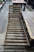 Wooden adjustable sun lounger on wheels