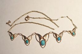 Edwardian gold necklace formed of five graduated links, of Art Nouveau design, each set with a