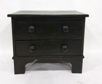 Painted low chest of two drawers, on bracket feet, 76cm x 64cm
