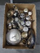 Silver plated serving dish, assorted silver plated hot water jugs, condiments, etc