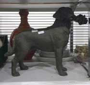 Resin large model of a labrador holding a bunch of flowers