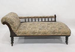 Victorian oak-framed chaise longue on turned supports to brown china castors