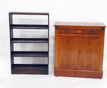 Yew side cabinet with single drawer above two cupboard doors, to plinth base and a 20th century