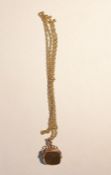 9ct gold, cornelian and bloodstone set revolving fob pendant and a gold-coloured chain-link necklace