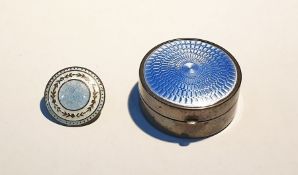Silver pill box of circular form, the hinged cover set with blue engine-turned enamel, 4cm