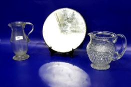 19th century glass jug, baluster-shaped, 19cm high, an engraved water jug with serrated edge, floral