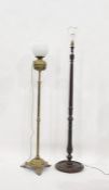 A 19th century brass telescopic standard oil lamp converted to electricity and a 20th century