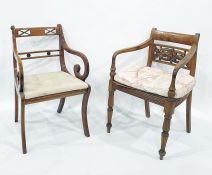 Cane-seated carver chair and another carver chair on sabre front legs (2)