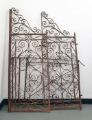 Pair of wrought iron garden gates with scroll decoration and a further gate (3)  Condition ReportThe