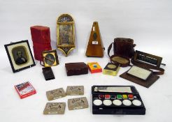 Maelzel metronome, pair of binoculars in leather carrying case, Ambro-type portrait photograph,