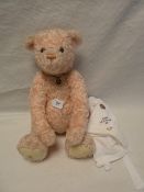 A Dean's limited edition teddy bear with its certificate of authenticity of a limited edition bear