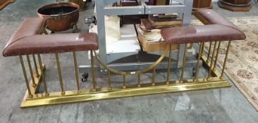 A late 19th/early 20th century club fender, the brown leather seat above the brass body, 172cm x